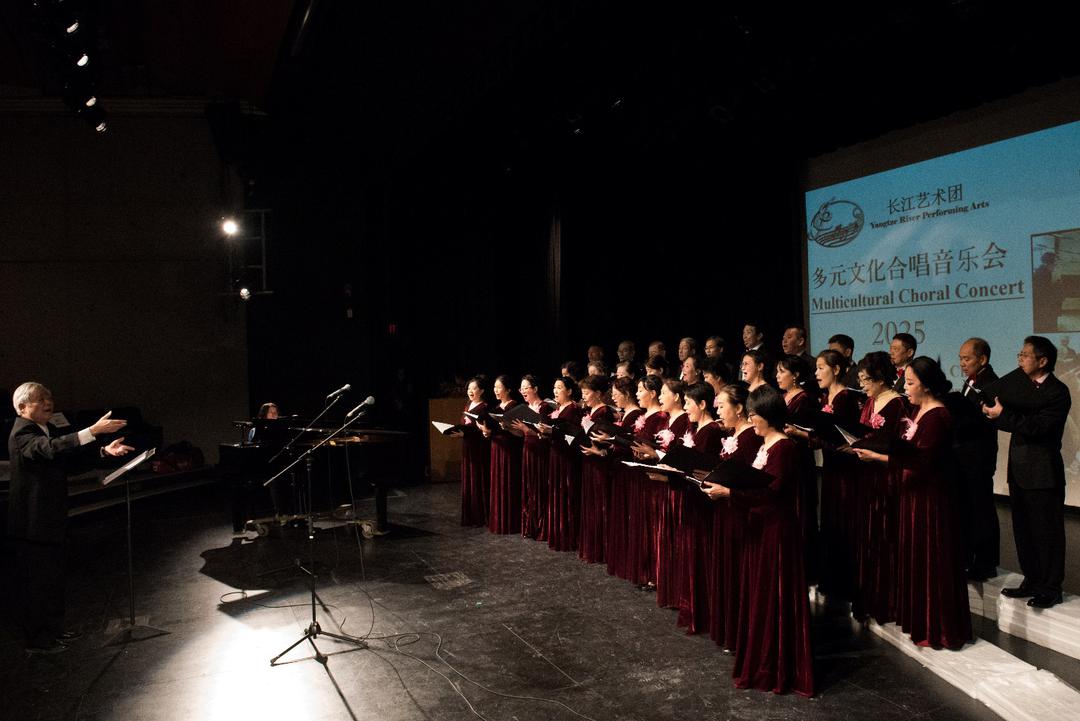 A group of choir members performing on stage

AI-generated content may be incorrect.
